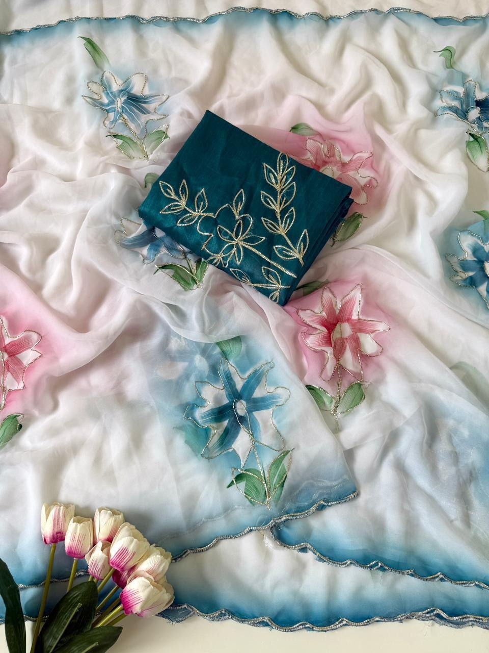Floral spray paint saree